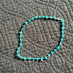 Turquoise coloured necklace